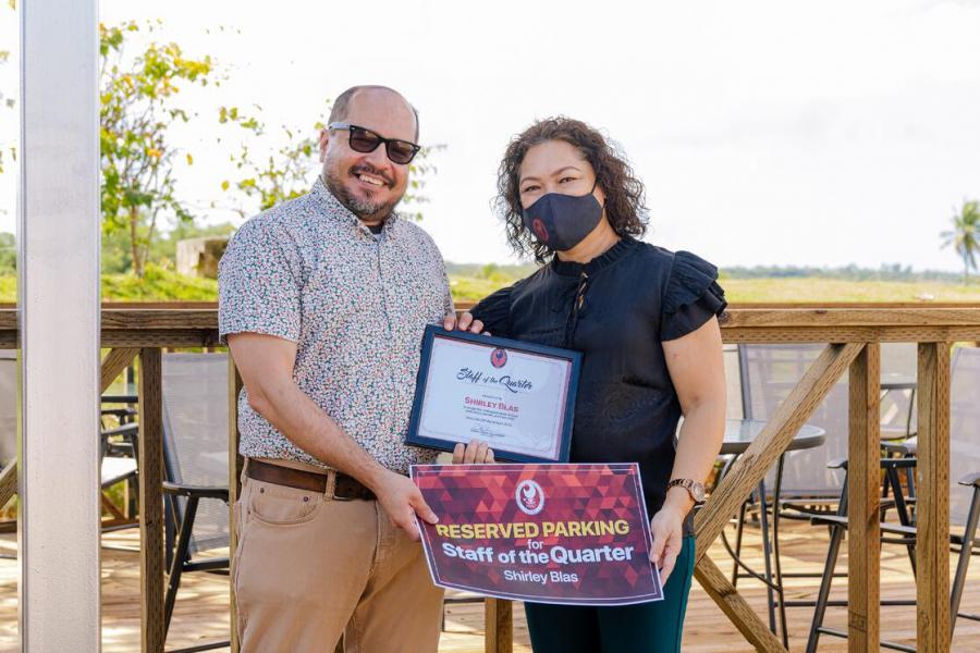 NMC Staff of the Quarter award recipient Shirley Blas (right) with NMC President Galvin Deleon Guerrero, EdD, (left).