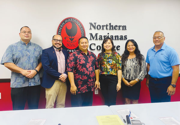 Gov. Ralph DLG Torres, center, is joined by House Speaker Edmund Villagomez (Ind-Saipan), left, NMC president Dr. Galvin Deleon Guerrero, second from left, NMC Board of Regents members Michelle L. Sablan, Irene T. Torres, and NMC Board of Regents chair Charles V. Cepeda, rightmost. (LEIGH GASES)